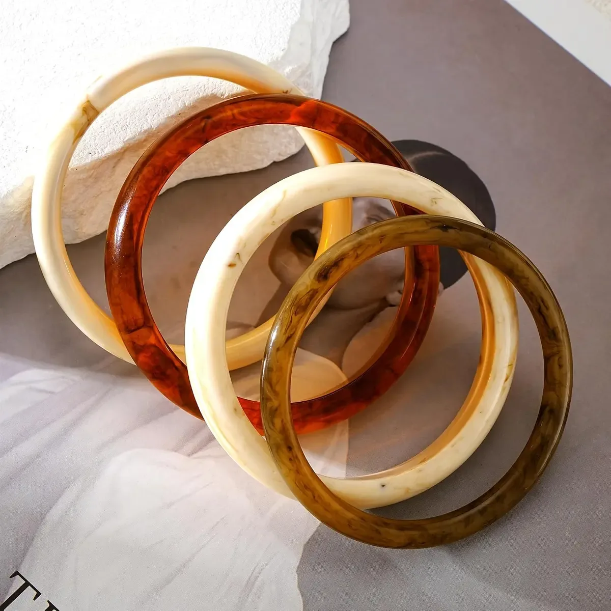 Close-up of the glossy surface of the chunky resin bangles