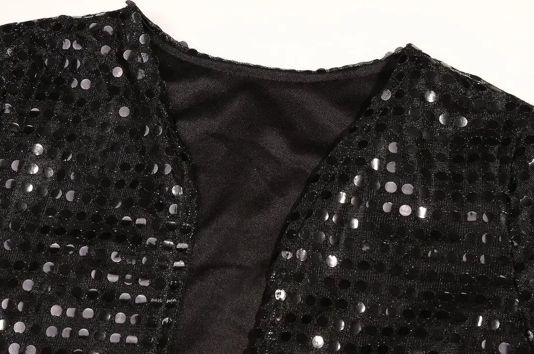 Shimmering sequin jacket detail on the kids 80s pop star costume