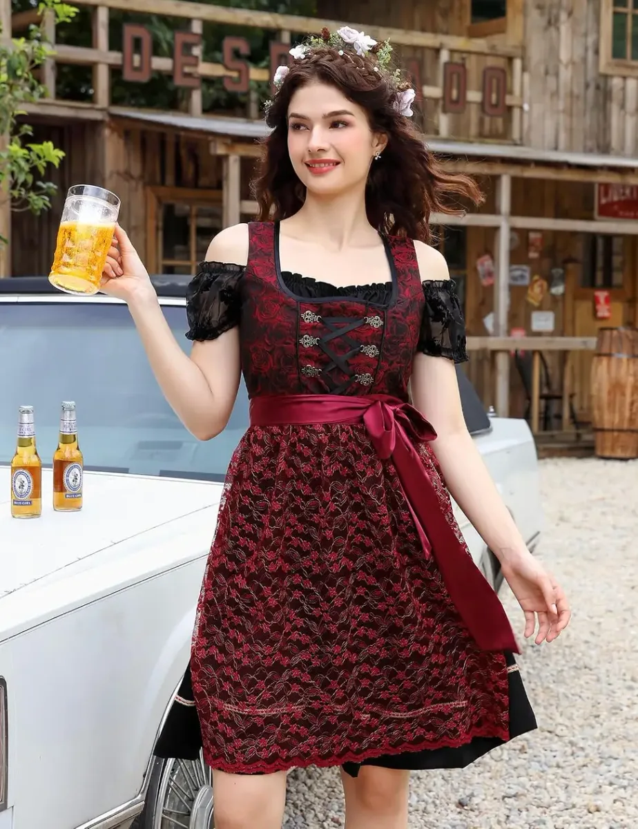 Full outfit of the dirndl dress with blouse and apron outdoors