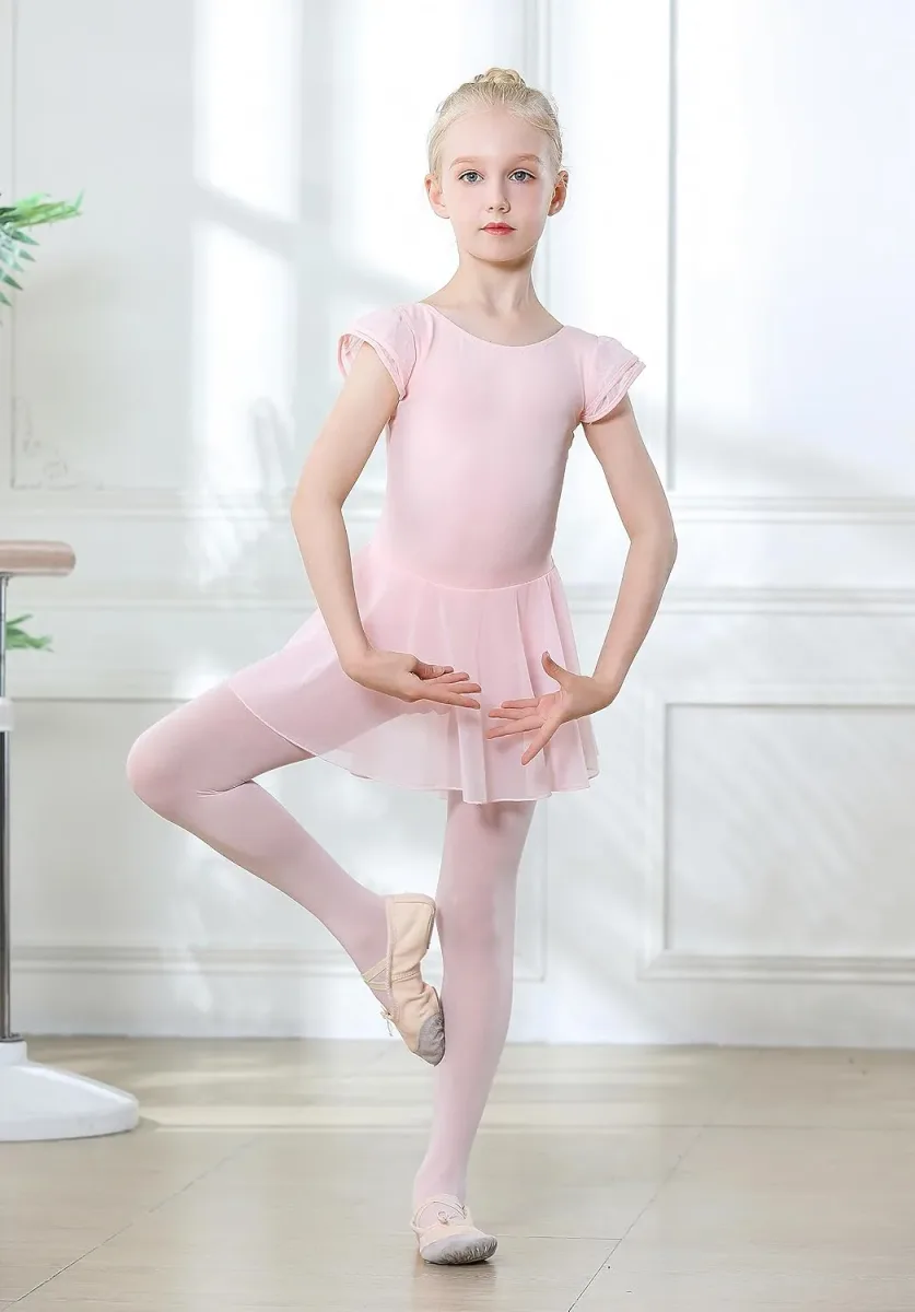 Child in first position wearing the girls ballet leotard with skirt