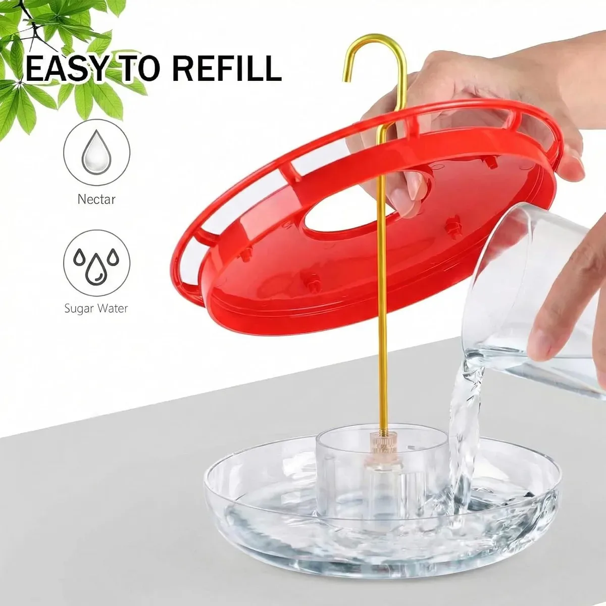 Refilling the saucer hummingbird feeder with the lid removed