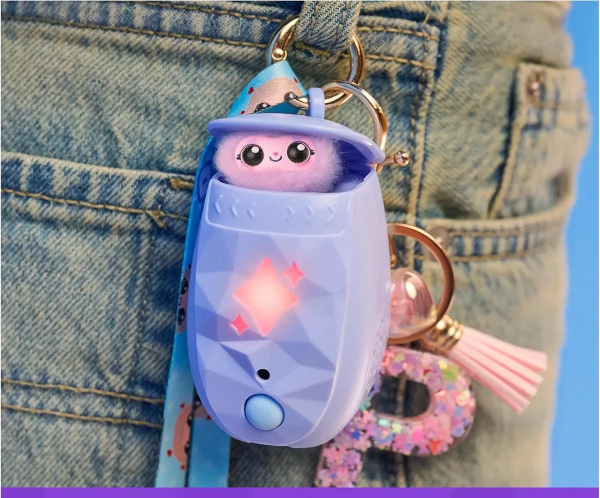 Digital pet toy worn as a bag charm and keychain