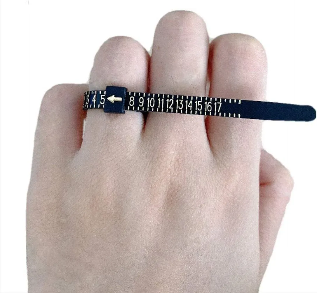 Pulling the ring sizer snug around a finger to measure