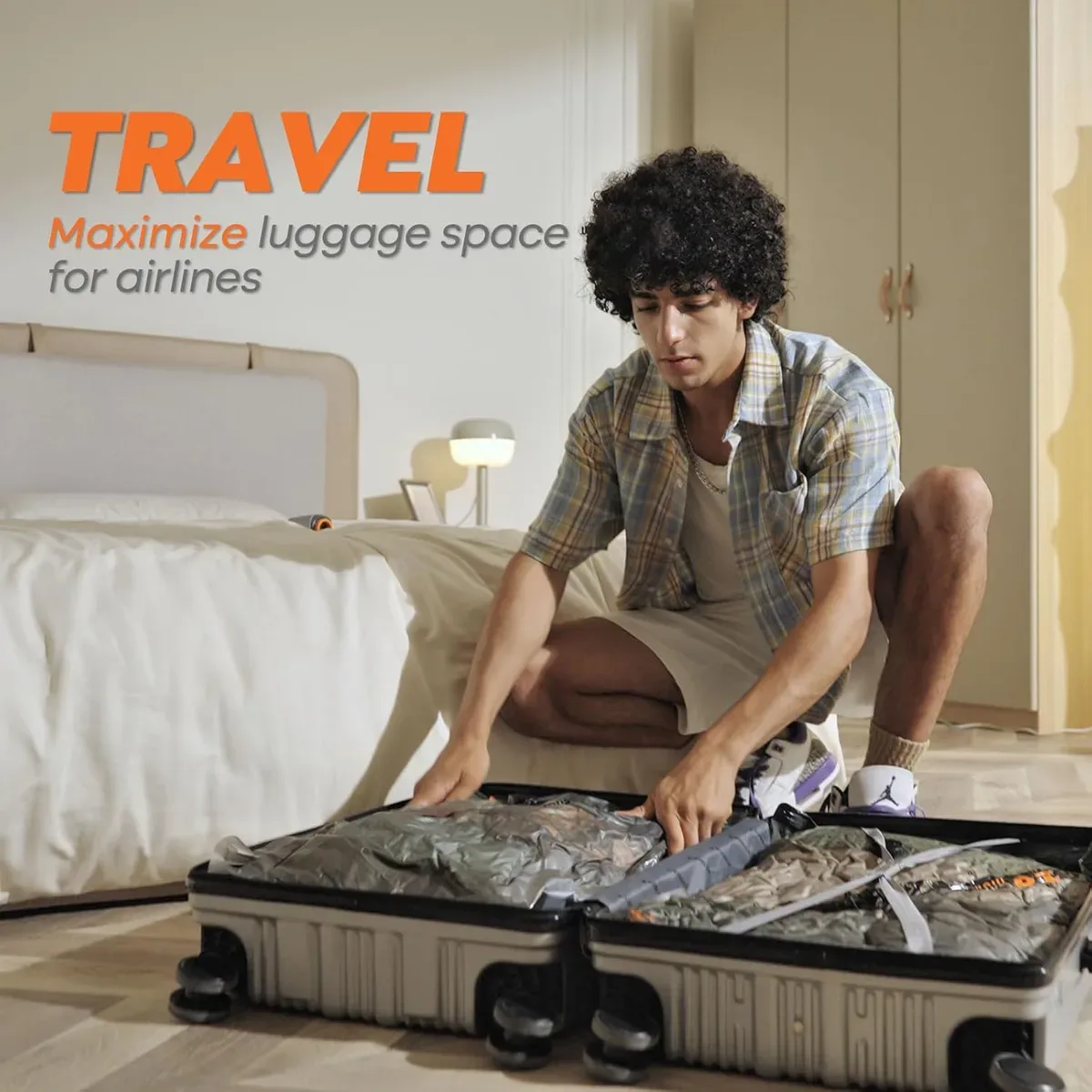 Suitcase packed with compressed vacuum bags with electric pump