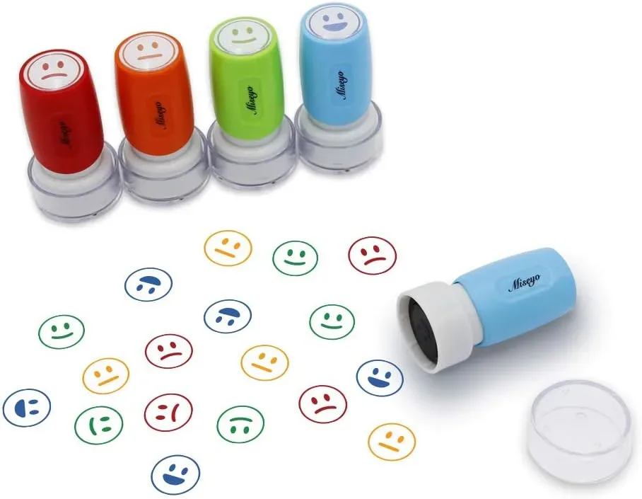 Happy, okay and sad faces from the teacher smiley face stamp set