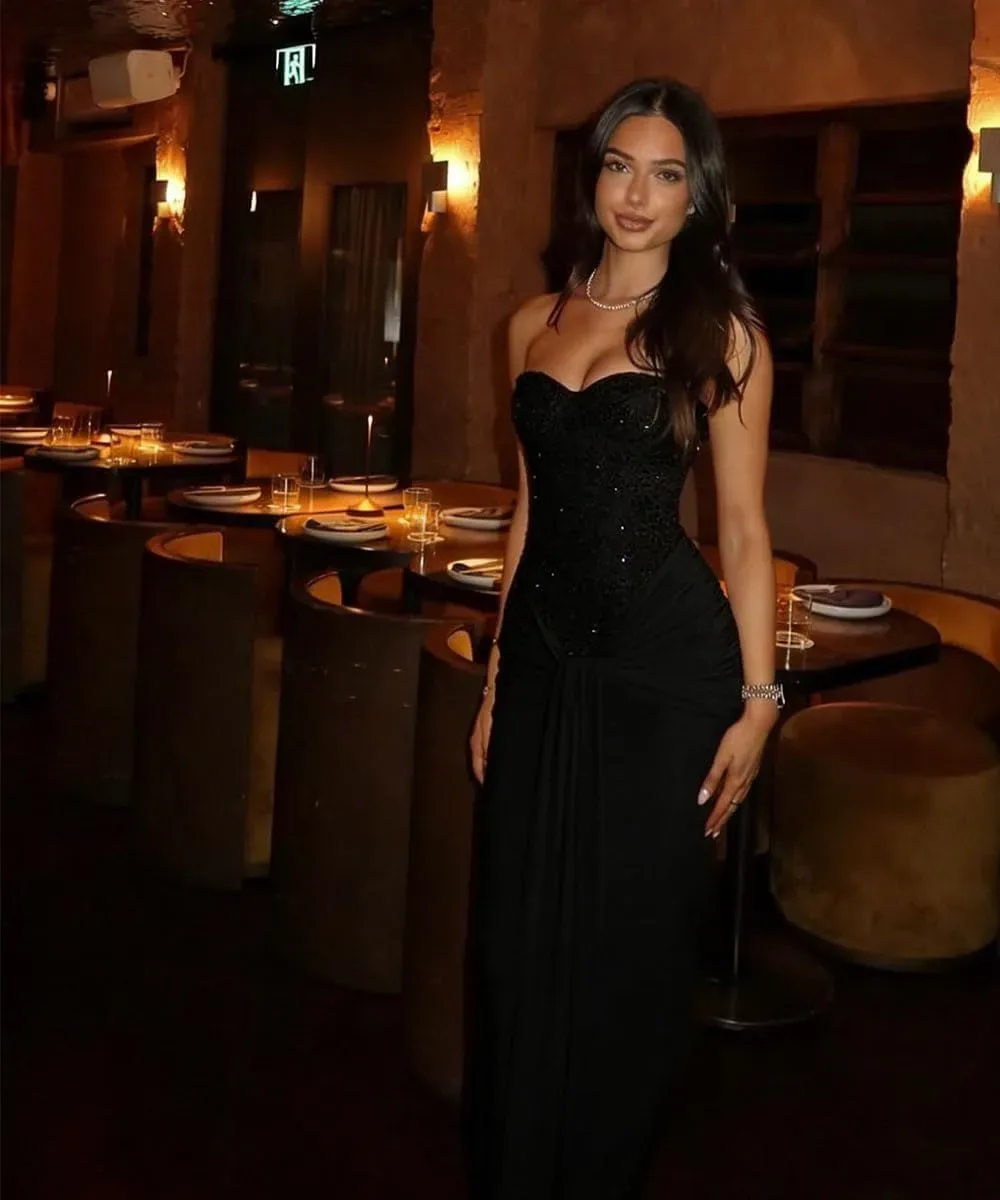 Strapless corset maxi dress styled for a formal evening