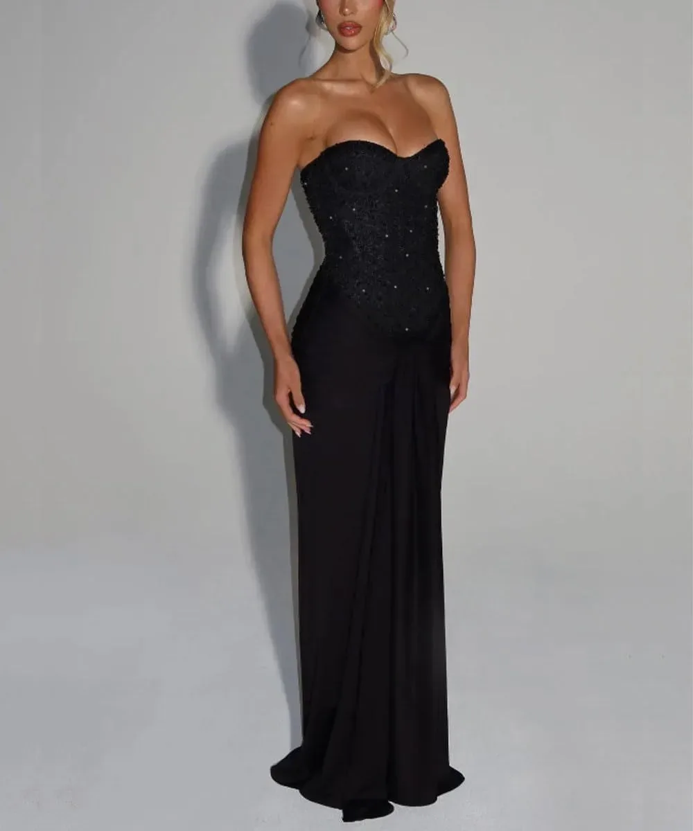 Front view of the strapless corset maxi dress on a model