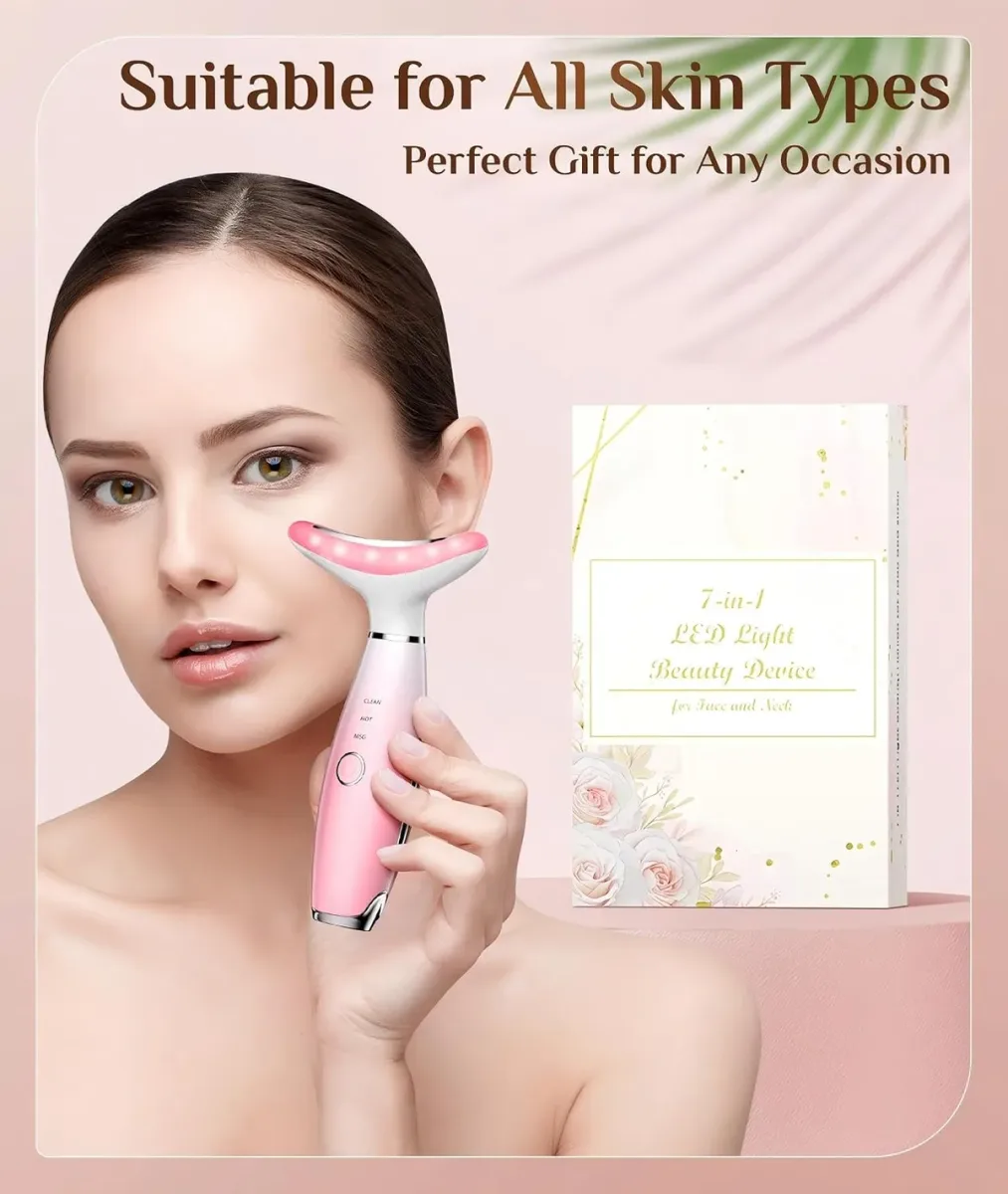 Woman gliding the LED face massager along her jawline