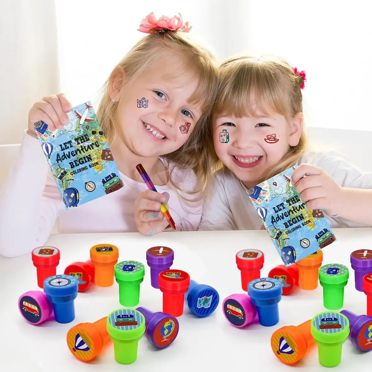 Children sharing self-inking stampers for kids as party favors